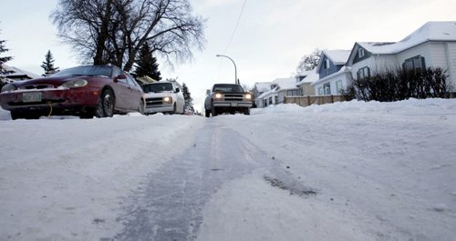 Ice ruts on Chalmers Ave. For Ice Ruts story  Wayne Glowacki / Winnipeg Free Press Dec.9 2013