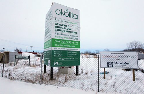 New condos under construction on the west side of  St. Marys Rd. between Britannica Rd. and  Vista Ave. in a place called Okolita Park. BORIS MINKEVICH / WINNIPEG FREE PRESS  December 9, 2013