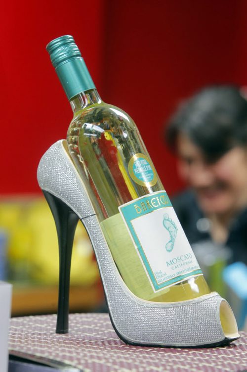 49.8 - INTERSECTION - Christmas Gift Guide Gifts. Happy Cooker offers stiletto heel wine caddy. BORIS MINKEVICH / WINNIPEG FREE PRESS  December 9, 2013