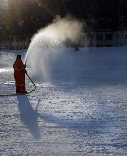 STDUP  , Cold is a Good Thing , if your making outdoor ice for community centres  and park rinks , a cold snap is even better , city worker Fred Wilde  put  water on the  Central Park outdoor rink in minus 21 temps , will be cold all week  Dec. 10 2013 / KEN GIGLIOTTI / WINNIPEG FREE PRESS