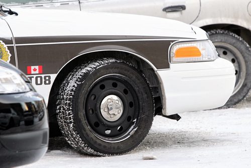 Tires on Winnipeg Police Service cruiser cars.  131210 - December10, 2013 MIKE DEAL / WINNIPEG FREE PRESS