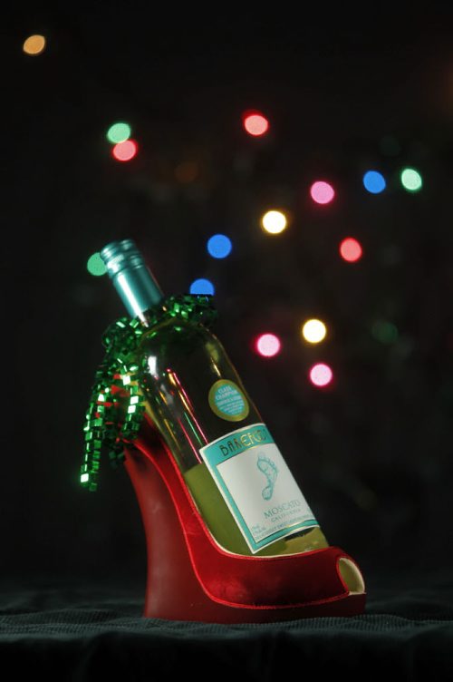 49.8 - INTERSECTION - Christmas Gift Guide Gifts. Happy Cooker sells a stiletto heel wine caddy. There is a few styles to choose from. BORIS MINKEVICH / WINNIPEG FREE PRESS  December 9, 2013