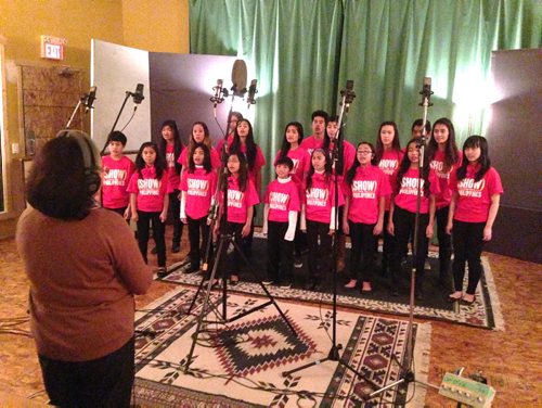 Local singer Maria Aragon in Private Ear Recording studio  performs  benefit song--United We Stand for typhoon relief in Philippines along with choir.  Separate shots taken during recording and group photo. See Kevin Prokosh story.    Dec 07, 2013 Ruth Bonneville / Winnipeg Free Press