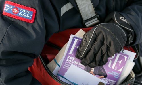 Canada Post plans to halt door-to-door mail delivery, reducing the total number of mail carriers by attrition -  mostly retirements. 131211 - Wednesday, December 11, 2013 - (Melissa Tait / Winnipeg Free Press)