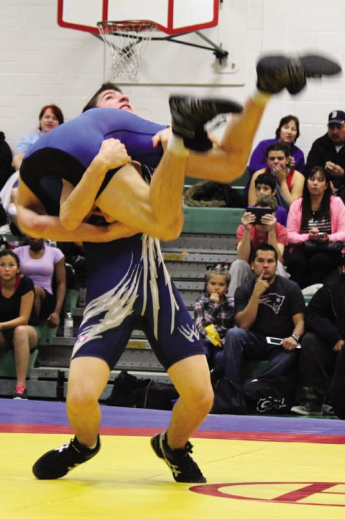 Canstar Community News Evan Gobeil scoops his opponent up off his feet before taking him down to the mat. (JORDAN THOMPSON)