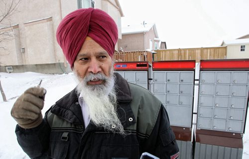 Amarjit Sing Bedi has lived in the Fox Warren area of the city for 15 years and has had no issue with the Super Box mail system in all that time. 131211 - December11, 2013 MIKE DEAL / WINNIPEG FREE PRESS