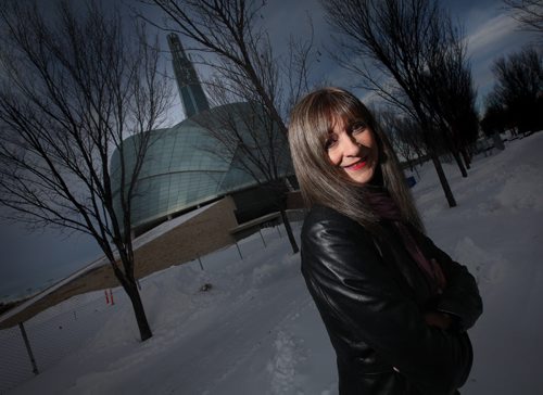 Deb Goodfellow poses in front of the Museum for Human Rights Wednesday. See her story re: Our Winnipeg. December 11, 2013 - (Phil Hossack / Winnipeg Free Press) CMHR