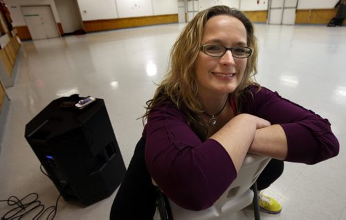 Jill Graham, a Winnipeg lab technician who lost more than 100 pounds  poses before leading a Zumba class at a St James Community Center Thursday. Her impetus was a local chapter of TOPS, a not-for-profit weight loss group based in the United States. December 2, 2013 - (Phil Hossack / Winnipeg Free Press)