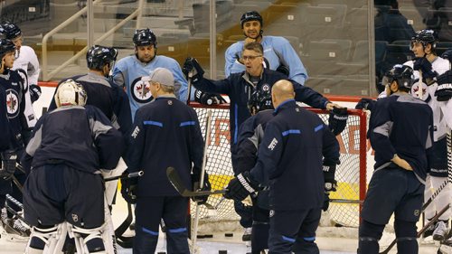 Coach  Claude Noel talks with the Jets before the practice began -  Jets Practice  at MTS Centre in front of 1700 fans , school groups were bussed to the practice to watch the team-  Dec. 13 2013 / KEN GIGLIOTTI / WINNIPEG FREE PRESS