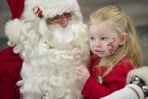 131214 Winipeg - DAVID LIPNOWSKI / WINNIPEG FREE PRESS (December 14, 2013)  Where: Red River College, 2055 Notre Dame, in the cafeteria for Breakfast with Santa  Santa hugs and speaks with Alexis Schroeder (age 2). Wayne Johnson who was Santa at a kids' breakfast at Red River College Saturday December 14, 2013.   Dave Sanderson Story for the Intersection section on the men behind the Santa beards at Christmas time