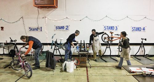 Volunteers get together at the Orioles Communtiy Centre for a 24-hour bike repair marathon. Over 250 bicycles were repaired for children whose families can't afford to buy one for Christmas. 131215 - December 15, 2013 MIKE DEAL / WINNIPEG FREE PRESS