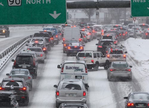Snow Drive- Cars are crawling on Route 90 North this morning in Winnipeg due to morning flurries.- On a positive front Environment Canada predicts a high of -3C-  Standup photo- Dec 16, 2013   (JOE BRYKSA / WINNIPEG FREE PRESS)