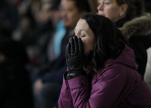 December 15, 2013 - 131215  -  Jane Hantscher reacts as her son's team the 12A1 Fort Garry North Flyers plays the 12A1 Dakota Lazers at St Vital Arena Sunday, December 15, 2013. John Woods / Winnipeg Free Press