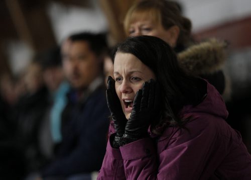 December 15, 2013 - 131215  -  Jane Hantscher reacts as her son's team the 12A1 Fort Garry North Flyers plays the 12A1 Dakota Lazers at St Vital Arena Sunday, December 15, 2013. John Woods / Winnipeg Free Press