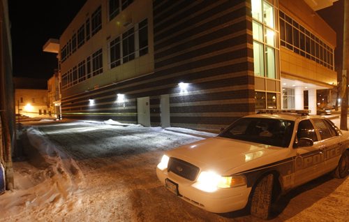 Winnipeg Police have a back alley behind the United Way building on Main St. at Alexander Ave. taped off Wednesday morning. Alexander Ave. at Main is closed to traffic. Wayne Glowacki / Winnipeg Free Press Dec.18. 2013