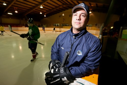 Transcona Railer Express head coach Mike Gordichuk for 49.8 feature about smokeless tobacco (chewing tobacco) at the Roland Michener Arena, Wednesday, December 19, 2013. (TREVOR HAGAN/WINNIPEG FREE PRESS)