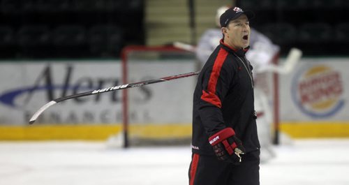 Head Coach Kevin Dineen of Team Canada women's hockey players at Ralph Engelstad Arena in Grand Forks Thursday. See Gary Lawless story. December 19, 2013 - (Phil Hossack / Winnipeg Free Press)