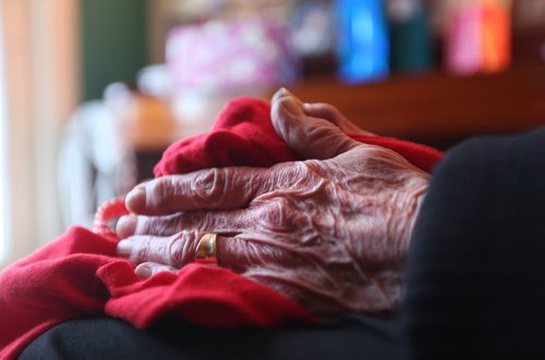 A frail elderly women sits next to her  Dec 21, 2013 Ruth Bonneville / Winnipeg Free Press