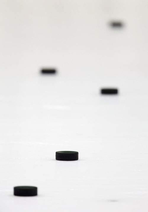 File art of hockey pucks for 49.8 on chew (chewing tobacco) (smokeless tobacco) at Selkirk Steelers versus Portage Terriers, at Selkirk Rec Complex, Sunday, December 22, 2013. (TREVOR HAGAN/WINNIPEG FREE PRESS)