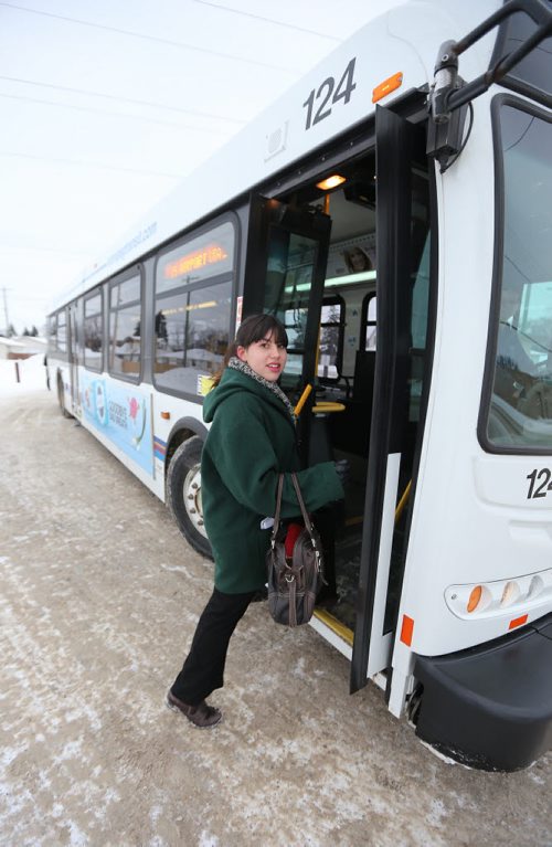 Winnipeg Free Press reporter intern Jessica Botelho-Urbanski gets on a No. 15 Winnipeg Transit bus on Thurs., Dec. 26, 2013. Botelho-Urbanski has been writing a blog about talking to Winnipeg bus riders. Photo by Jason Halstead/Winnipeg Free Press