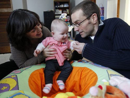 Money Matters/ The cost of bringing up baby. Matt Solvason and Anabela Lopes with their daughter Charlotte. Joel Schlesinger story Wayne Glowacki / Winnipeg Free Press Dec.27. 2013