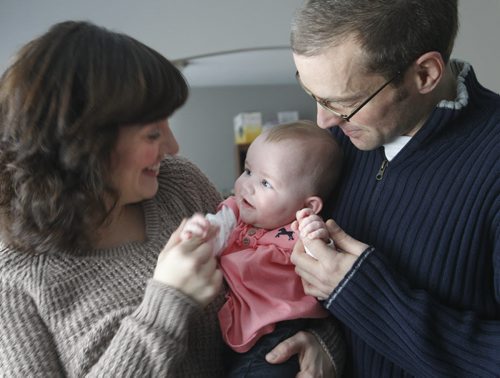 Money Matters/ The cost of bringing up baby. Matt Solvason and Anabela Lopes with their daughter Charlotte.  Joel Schlesinger  story Wayne Glowacki / Winnipeg Free Press Dec.27. 2013