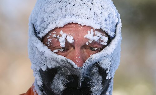 Sheldon Reynolds frosts up during his two-hour run at Kildonan Park on Sun., Dec. 29, 2013. Photo by Jason Halstead/Winnipeg Free Press