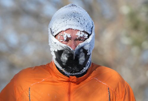 Sheldon Reynolds frosts up during his two-hour run at Kildonan Park on Sun., Dec. 29, 2013. Photo by Jason Halstead/Winnipeg Free Press