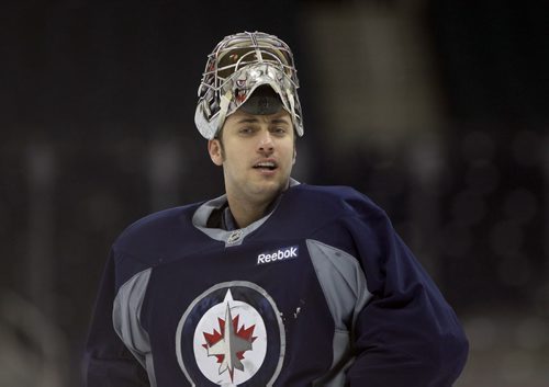 Winnipeg Jets goaltender Ondrej Pavelec  at practice Monday afternoon at the MTS Centre  - The Winnipeg Jets are in preparation for a home game tomorrow night against the Buffalo Sabers - Standup photo- Dec 30, 2013   (JOE BRYKSA / WINNIPEG FREE PRESS)