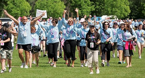 BORIS MINKEVICH / WINNIPEG FREE PRESS  070610 Walkers march into Assiniboine Park for the closing ceremonies of the breast cancer fund raiser.