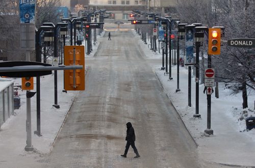 Stark looking Graham Ave in Winnipeg Thursday morning- Downtown Winnipeg appeared almost disserted as many took a few days off after New Years  See story- Jan 02, 2014   (JOE BRYKSA / WINNIPEG FREE PRESS)