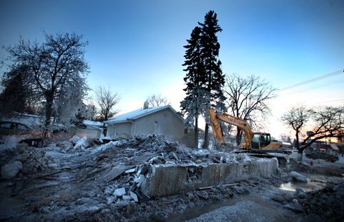 A frosty pile of rubble is all that remains at Havelock and St Mary's Rd after a fire New Years Day. See story. Jan 2, 2014 - (Phil Hossack / Winnipeg Free Press)