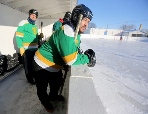 Tom McMahon, left, and Dewey Ackegan watch from the bench during the Tumbleweeds spongee game agaist the Mighty Puckin Drunks at Melrose Community Centre, Saturday, Wednesday, January 4, 2014. The Tumbleweeds are the oldest spongee team in the world. (TREVOR HAGAN/WINNIPEG FREE PRESS) - for dave sanderson