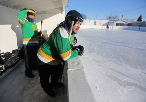Tom McMahon, left, and Dewey Ackegan watch from the bench during the Tumbleweeds spongee game agaist the Mighty Puckin Drunks at Melrose Community Centre, Saturday, Wednesday, January 4, 2014. The Tumbleweeds are the oldest spongee team in the world. (TREVOR HAGAN/WINNIPEG FREE PRESS) - for dave sanderson