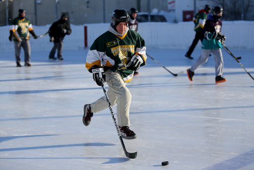 Colin Mackenzie of the Tumbleweeds, plays against the Mighty Puckin Drunks during a spongee game at Melrose Community Centre, Saturday, Wednesday, January 4, 2014. The Tumbleweeds are the oldest spongee team in the world. (TREVOR HAGAN/WINNIPEG FREE PRESS) - for dave sanderson