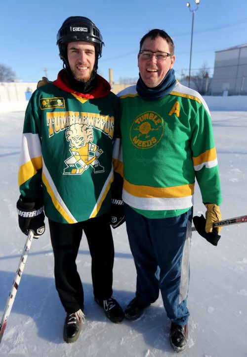 Jacob McMahon and his father, Tom McMahon of the Tumbleweeds spongee team following their game against the Mighty Puckin Drunks at Melrose Community Centre, Saturday, Wednesday, January 4, 2014. The Tumbleweeds are the oldest spongee team in the world. (TREVOR HAGAN/WINNIPEG FREE PRESS) - for dave sanderson