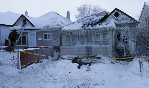 One of  several frigid over night fires in the the city , kept WFS  fire fighters busy , a house at 690 Pritchard Ave was completely destroyed and damaged 688 Pritchard Ave next door  ,  the houses are being boarded up  JAN. 6 2014 / KEN GIGLIOTTI / WINNIPEG FREE PRESS