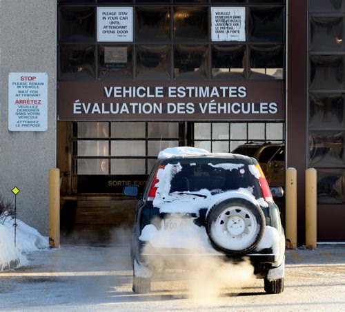 A driver eases his vehicle int the assessment bay at the Autopac Claims center on St Mary's Road Monday. See story re: incresed fender benders on city streets...... January 6, 2014 - (Phil Hossack / Winnipeg Free Press)