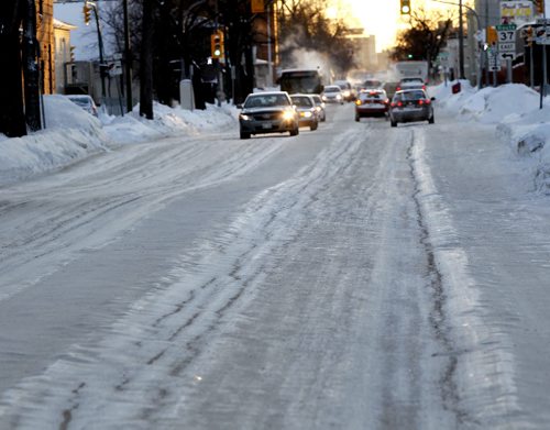Icy ruts on Salter Street Monday afternoon. With story.Wayne Glowacki / Winnipeg Free Press Jan.6  2014