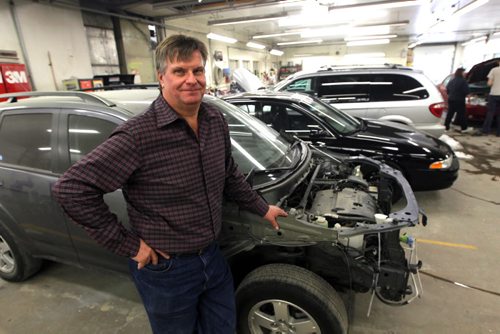 Kelly Kostynyk, the owner of Gateway Auto Body, for story on accidents in December. Photo taken at 715 Kimberly Ave. BORIS MINKEVICH / WINNIPEG FREE PRESS January 6, 2014