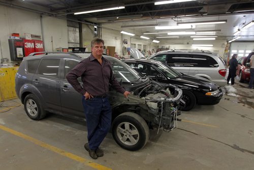 Kelly Kostynyk, the owner of Gateway Auto Body, for story on accidents in December. Photo taken at 715 Kimberly Ave. BORIS MINKEVICH / WINNIPEG FREE PRESS January 6, 2014