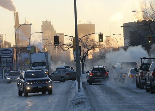 Stdup - Good Luck - Prepare for slow going with extreme cold , ice fog , and icy road conditions , pic on Notre Dame Ave at McPhillips St. JAN. 8 2014 / KEN GIGLIOTTI / WINNIPEG FREE PRESS