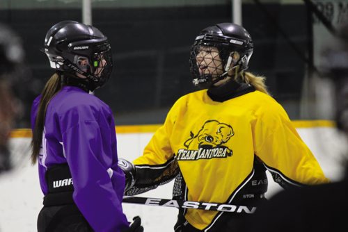 Canstar Community News Brittany Driedger (left) and Amanda Cabral chat during practice. (JORDAN THOMPSON)