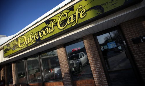 The Oakwood Cafe. anecdotal history of the Oakwood, a breakfast / lunch /dinner nook in trendy south Osborne - was one of the first restaurants in the area - shots of exterior and of owner Peter Paley and his partner Alix Loiselle. January 8, 2014 - (Phil Hossack / Winnipeg Free Press)