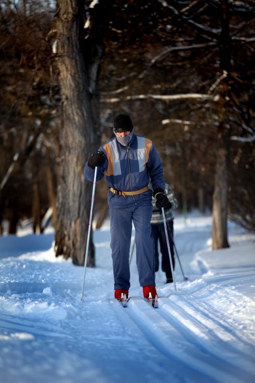 Keith Tipples braves the frigid temperatures Wednesday skiing in St VItal Park. Not willing to wait for tomorrow's warmer temperatures he and his wife Mo tackled the trails despite the gritty glide. January 8, 2014 - (Phil Hossack / Winnipeg Free Press)