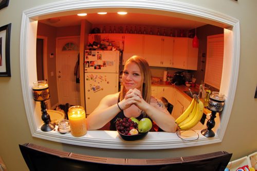 Kelly Zelinsky, wife and mother-of-three, lost 115 pounds in less than one year.  A shot of her in her kitchen surrounded by healthy food. REPORTER: Shamona Harnett. BORIS MINKEVICH / WINNIPEG FREE PRESS January 8, 2014