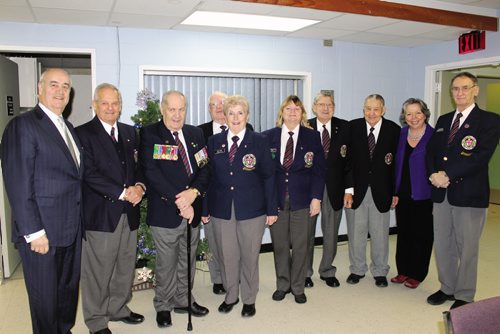 Canstar Community News Veterans Affairs Minister Julian Fantino (far left) and Joyce Bateman (second from right), MP for Winnipeg South Centre, stopped by the ANAF Rockwood Unit 303 building on Wilton Street Wednesday to visit with Legion members and executives. (JORDAN THOMPSON)