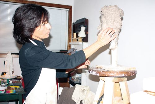 Canstar Community News Jan. 2/13 - North Kildonan artist Débora Cardaci is shown working on a sculpture in her studio. (DAN FALLOON/CANSTAR COMMUNITY NEWS/HERALD)