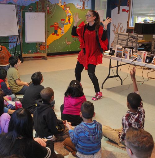 Author Anita Daher reads and interacts with kids at IRCOM.  BORIS MINKEVICH / WINNIPEG FREE PRESS January 9, 2014