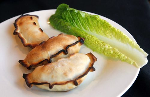 Restaurant Review - Simon's. Empanada (meat with raisin and olives). 513 St Mary's Road. BORIS MINKEVICH / WINNIPEG FREE PRESS January 10, 2014